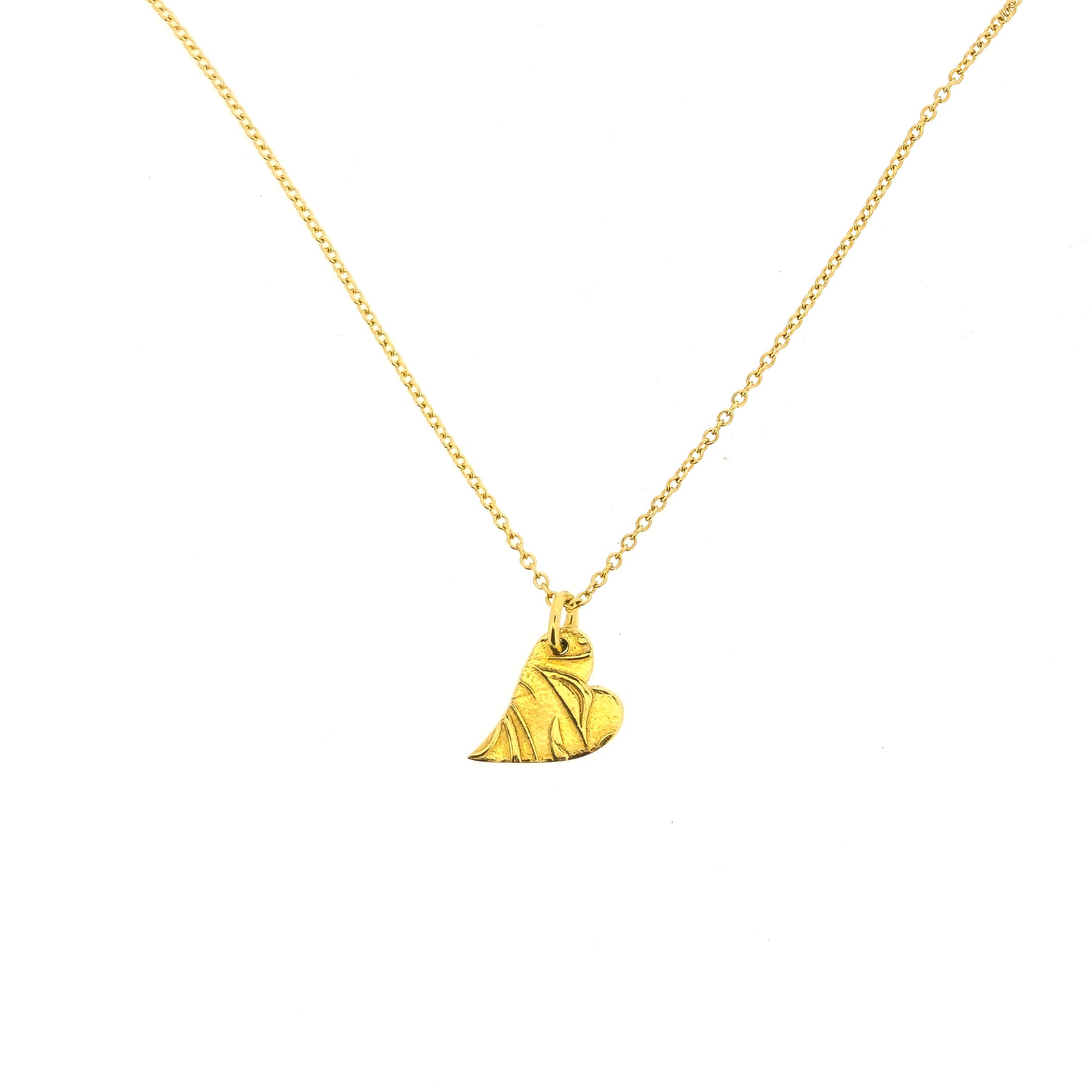 Yellow gold vermeil asymmetrical heart pendant with a leaf & vine design on a yellow gold vermeil chain.