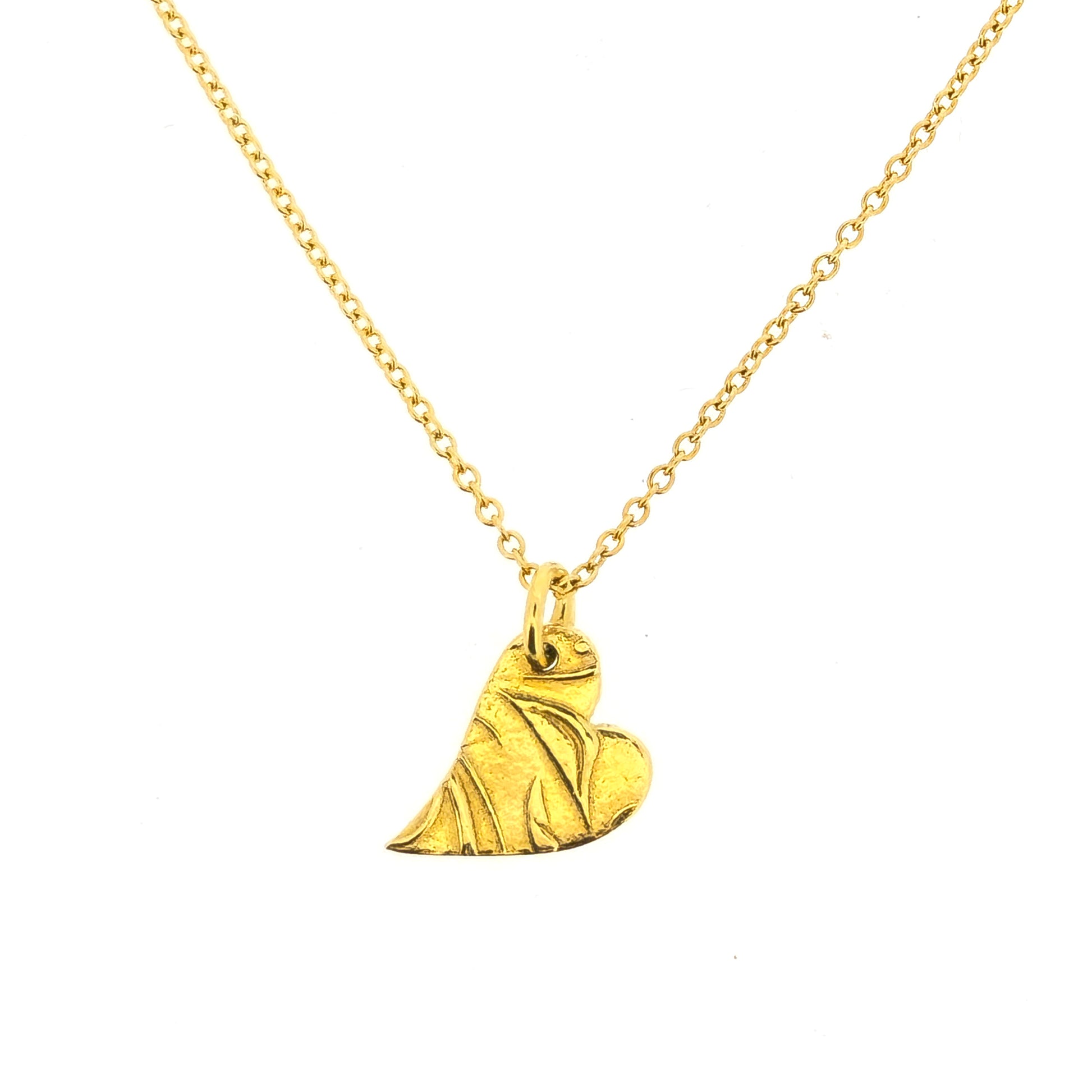 Yellow gold vermeil asymmetrical heart pendant with a leaf & vine design on a yellow gold vermeil chain.