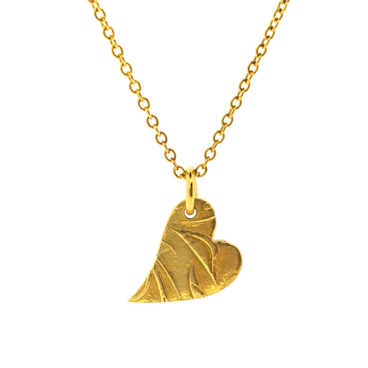 Yellow gold vermeil asymmetrical heart pendant with a leaf & vine design on a yellow gold vermeil chain.