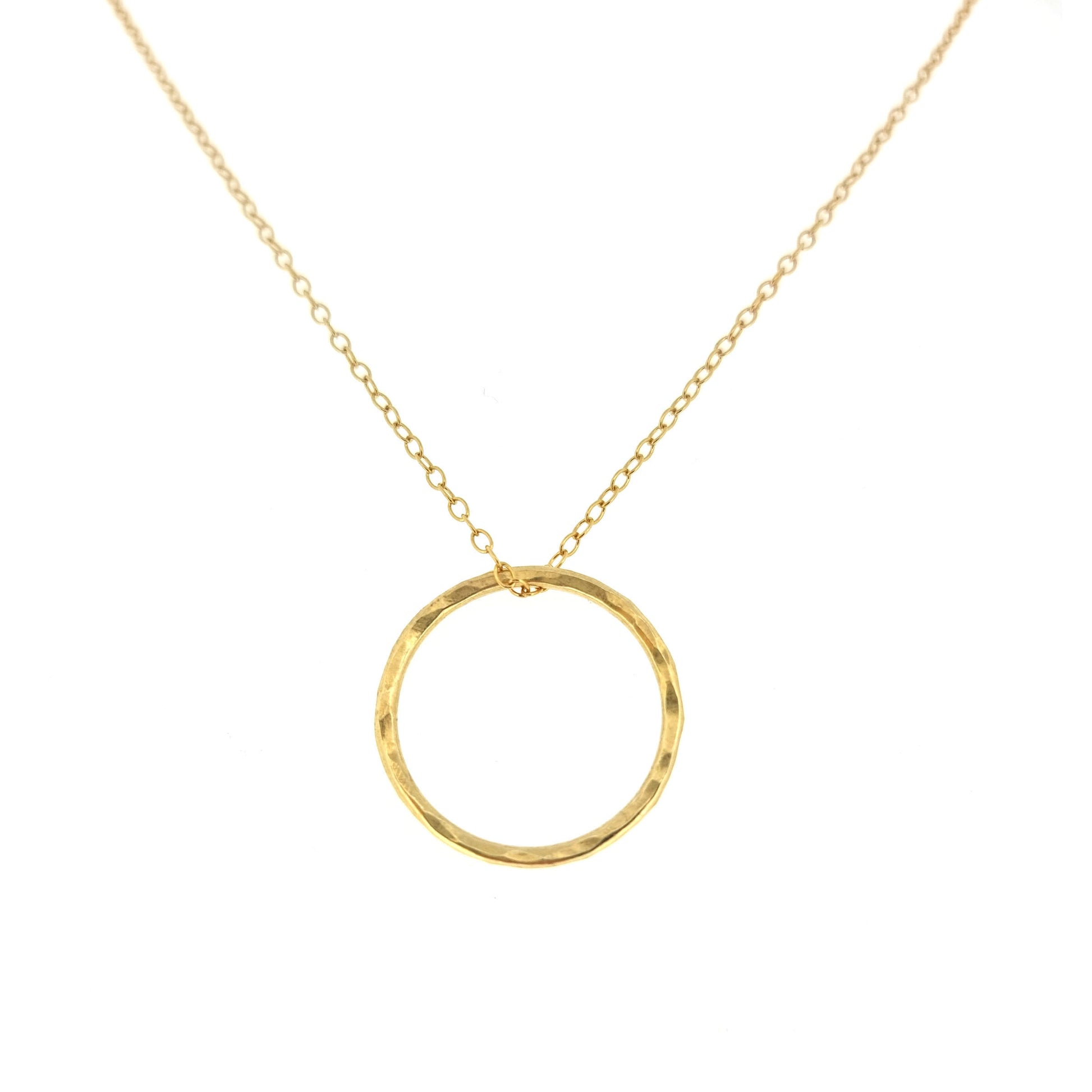 Yellow gold vermeil open circle pendant with hammered texture on a yellow gold vermeil chain. Large