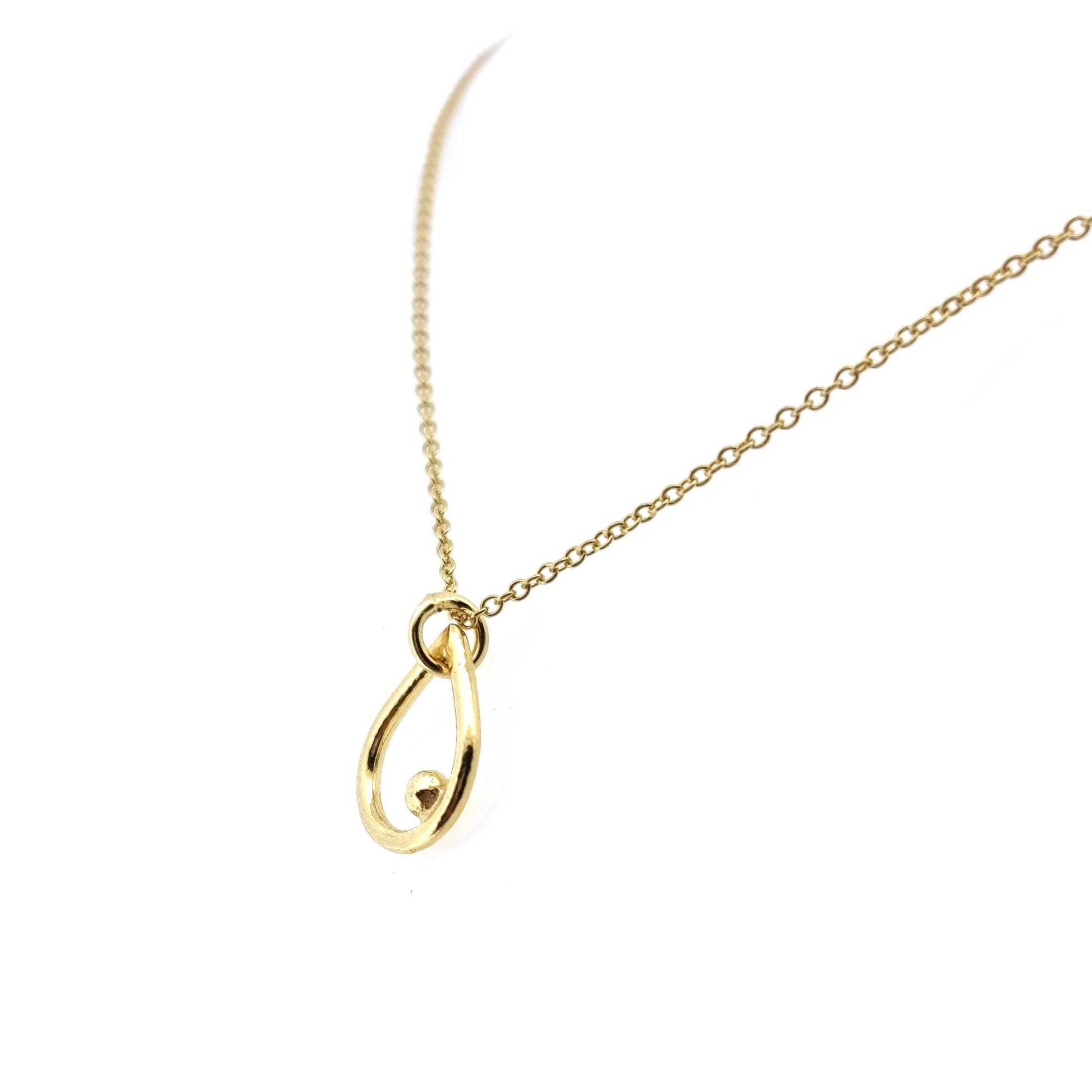 Yellow gold vermeil open teardrop shaped pendant with an off-centre ball on a yellow gold vermeil chain.