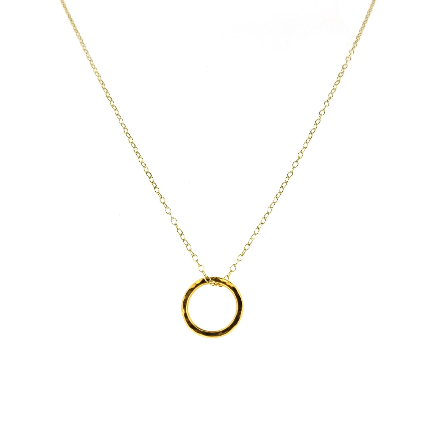 Yellow gold vermeil open circle pendant with hammered texture on a yellow gold vermeil chain. Small