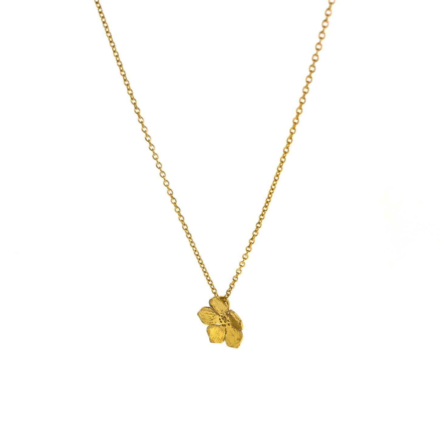 A yellow gold vermeil 5 petal flower pendant on a yellow gold vermeil chain. Small. Side view.